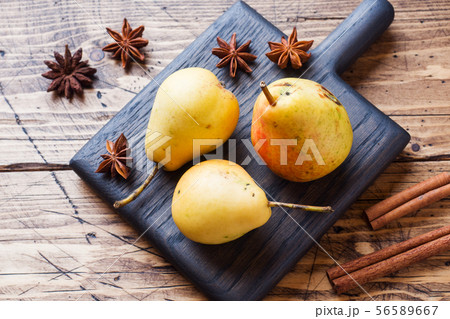 Ripe yellow pears on wooden background with copy  56589667