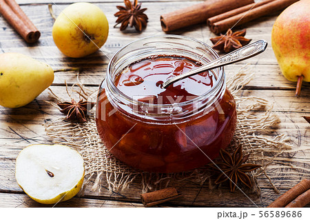 Homemade pear jam in a jar and fresh pears  56589686