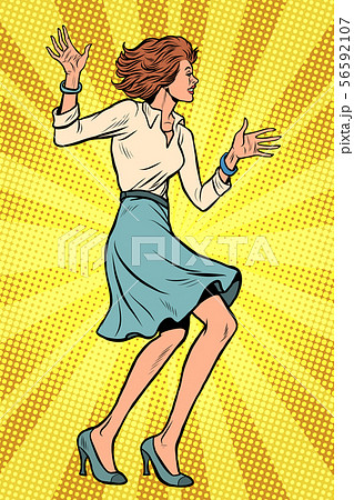 Beautiful young business woman dancing 56592107