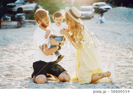family on a beach family on a beach 56600554