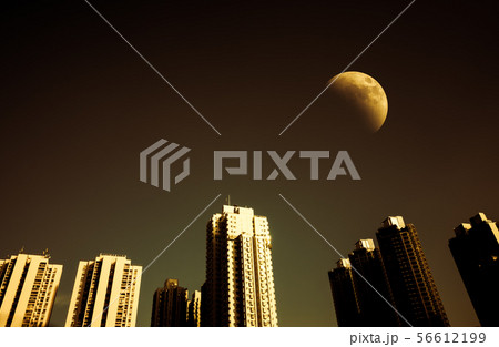 Cityscape at night time and darkness sky with half Cityscape at night time and darkness sky with half 56612199