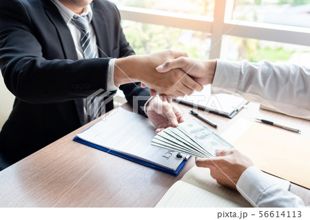 Bribery and corruption, Businessman hand giving 56614113