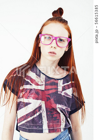 Beauty and skin care. Highly-detailed portrait of attractive redhead teenage girl with charming 56615385