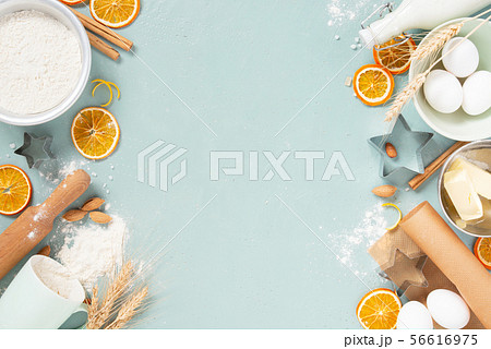 Blue background with raw ingredients for baking, Blue background with raw ingredients for baking, 56616975
