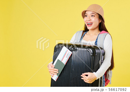 Happy woman with baggage 56617092