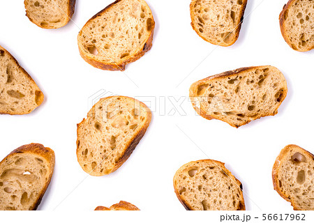 Pattern with pieces of white bread isolated on white background. 56617962