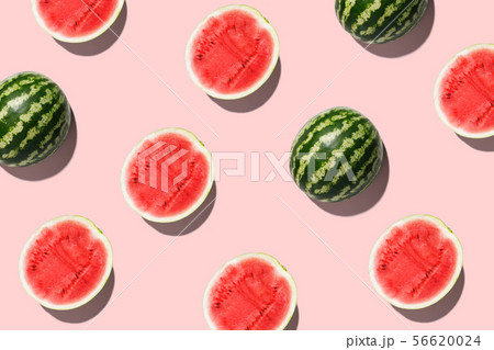 Pattern with ripe watermelon on pink background. Top View. Copy Space. Pop art design, creative 56620024