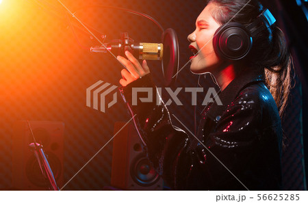Asian Teenager Woman sing song loudly power sound Asian Teenager Woman sing song loudly power sound 56625285