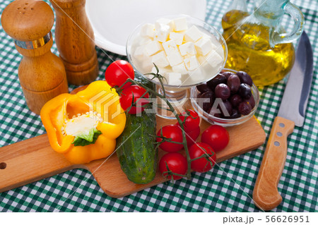 Traditional Greek fresh vegetable salad with feta cheese and herbs 56626951