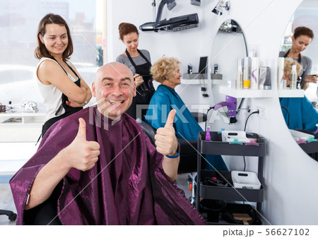 Happy man after haircut Happy man after haircut 56627102