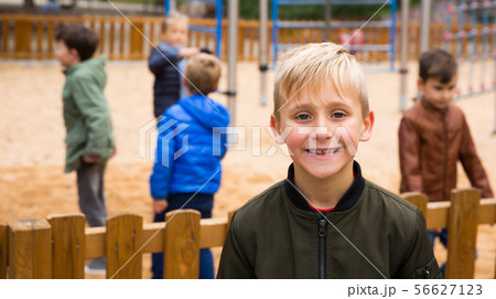 Happy boy on playground Happy boy on playground 56627123