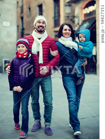 Positive family walking Positive family walking 56627351