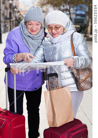 Mature ladies travellers with map Mature ladies travellers with map 56628584