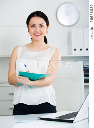 Female manager waiting for clients Female manager waiting for clients 56628880
