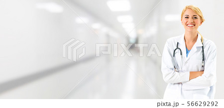 Woman doctor working at the hospital office. Woman doctor working at the hospital office. 56629292