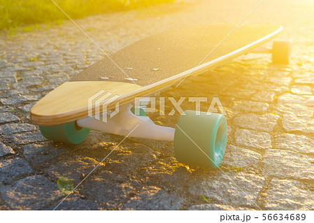 black longboard on the street 56634689