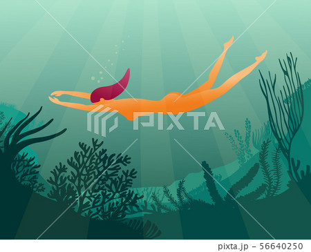 Girl diver on coral reef 56640250