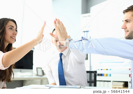 Joyful high five Joyful high five 56641544