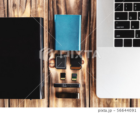 external hardisk, sd card and ssd card on table 56644091