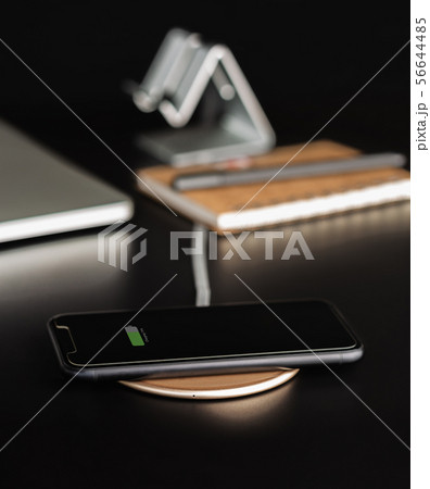 phone mobile charging on wireless charger phone mobile charging on wireless charger 56644485