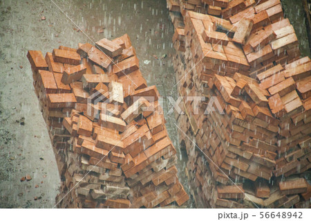 Stack of orange clay brick Stack of orange clay brick 56648942