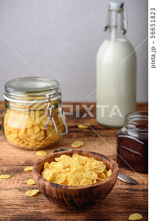 Breakfast with corn flakes, milk and jam Breakfast with corn flakes, milk and jam 56651823
