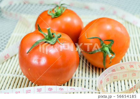 tomato with measuring tape tomato with measuring tape 56654185