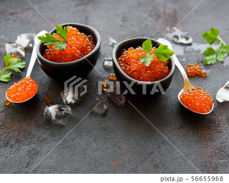 Red caviar on a black background 56655968