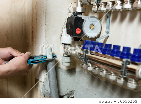 Installing the home heating system. 56656269
