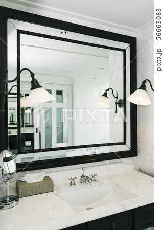 Beautiful luxury white sink and facuet water interior of bathroom Beautiful luxury white sink and facuet water interior of bathroom 56663083