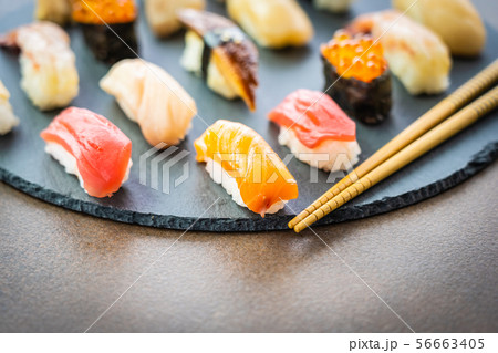 Nigiri sushi set with salmon tuna shrimp prawn eel shell and other sashimi 56663405