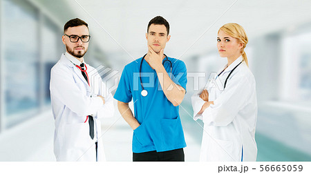 Doctor working in hospital with other doctors. Doctor working in hospital with other doctors. 56665059