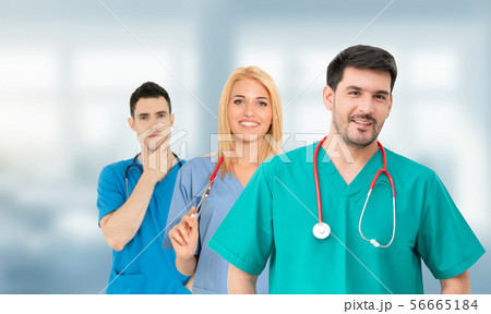 Doctor working in hospital with other doctors. Doctor working in hospital with other doctors. 56665184