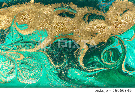 Green and gold marbling pattern. Golden powder marble liquid texture. Green and gold marbling pattern. Golden powder marble liquid texture. 56666349