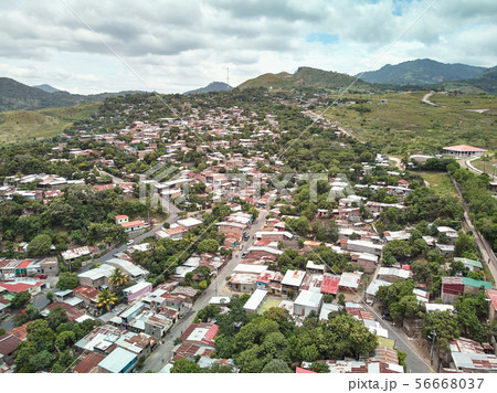 Small rural houses on hills 56668037
