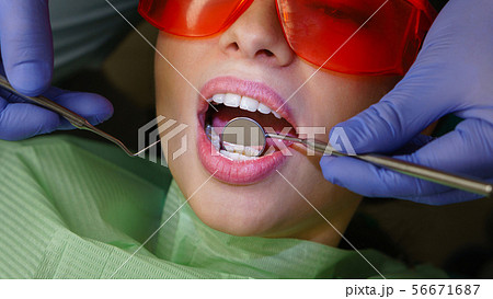 Girl patient in dental clinic Girl patient in dental clinic 56671687