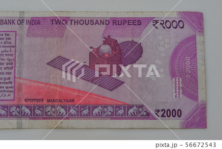 A new Indian currency note of 2000 rupees A new Indian currency note of 2000 rupees 56672543