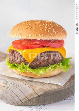 Hamburger on the wooden board 56678567