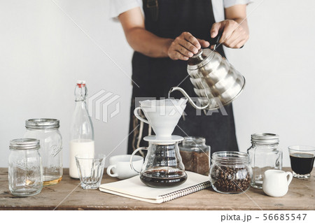 Drip coffee on a wooden bar White background 56685547