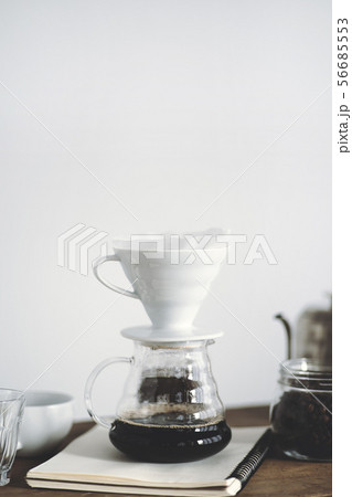 Drip coffee on a wooden bar White background 56685553