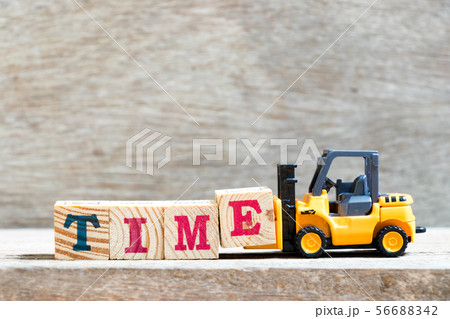 Toy forklift hold letter block e to word time Toy forklift hold letter block e to word time 56688342