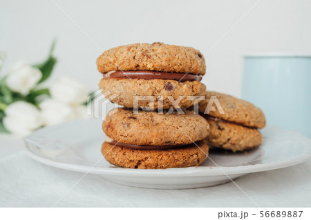 cookies Baci di Dama or Lady kisses with chocolate cookies Baci di Dama or Lady kisses with chocolate 56689887