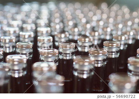 wine bottles with glass enclosures 56690722