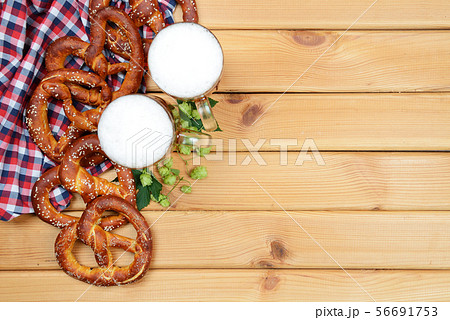 The hand-made pretzels, beer and hops  56691753