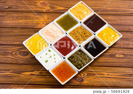 Set of different sauces in ceramic bowl Set of different sauces in ceramic bowl 56691926