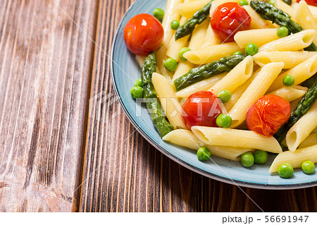 Penne pasta salad with asparagus , tomatoes and Penne pasta salad with asparagus , tomatoes and 56691947