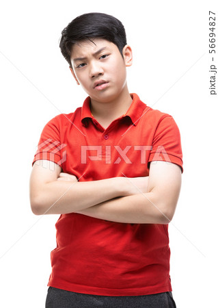 Angry boy isolated on white background. Angry boy isolated on white background. 56694827