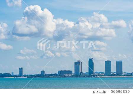 Beautiful landscape of sea with Pattaya cityscape and white cloud on blue sky Beautiful landscape of sea with Pattaya cityscape and white cloud on blue sky 56696859
