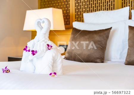 Beautiful elephant towel on bed decoration in bedroom interior 56697322