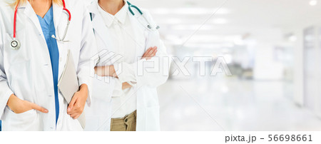 Doctor working in hospital with other doctors. Doctor working in hospital with other doctors. 56698661
